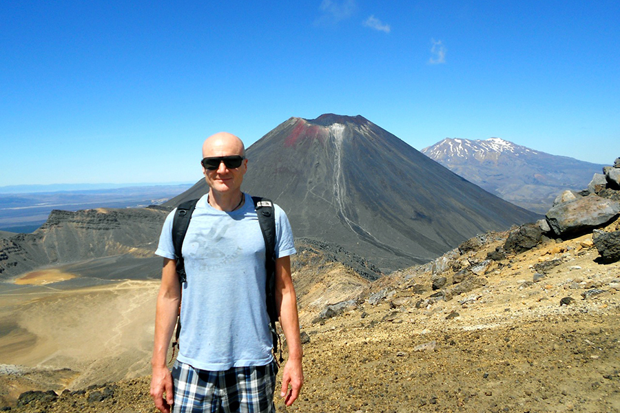 Haydn likes to walk across active volcanoes - stood at Mount Tongariro, New Zealand