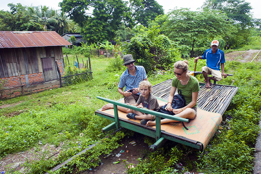 Enjoy a ride on the Bamboo Train, a small bamboo platform that chugs 8 kilometres through the jungle
