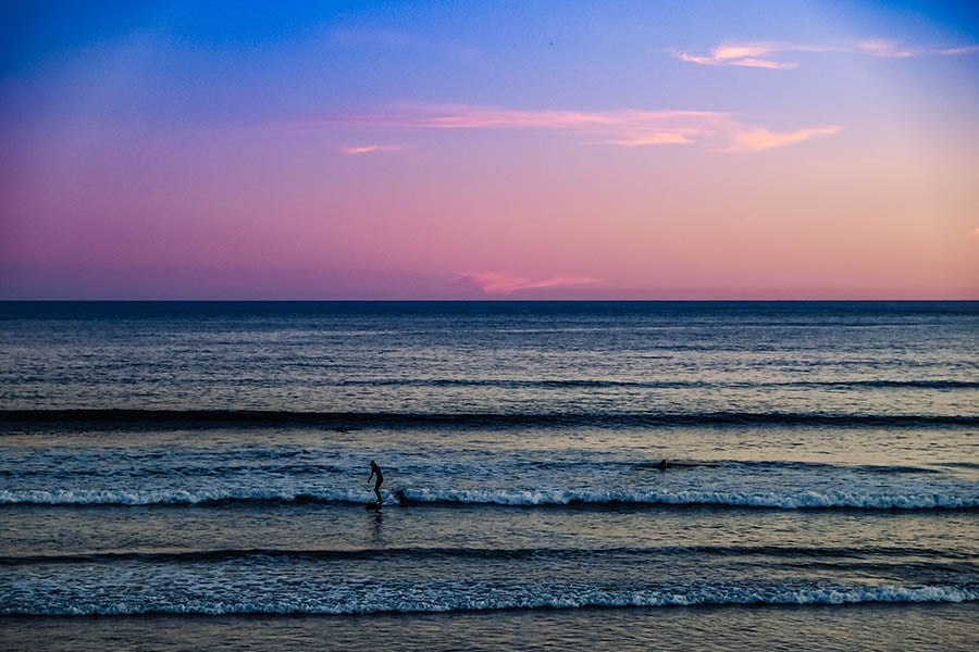 Watch the surfers at sunset on Tofino Bay | Travel Nation