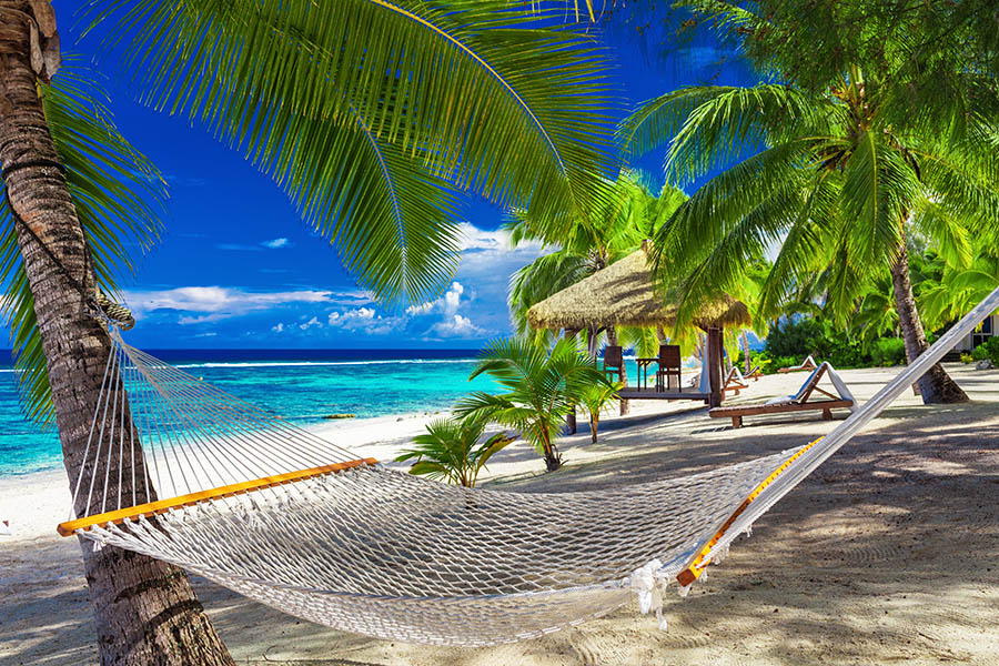 Stretch out in a hammock in The Cook Islands | Travel Nation