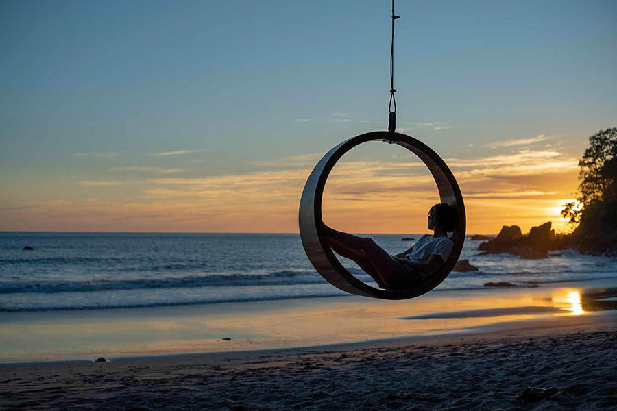Swing at sunset on the beach at Arenas del Mar Resort | Photo credit: Arenas del Mar Resort