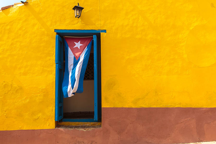 See Cuban flags hanging from every window in Cuba | Travel Nation