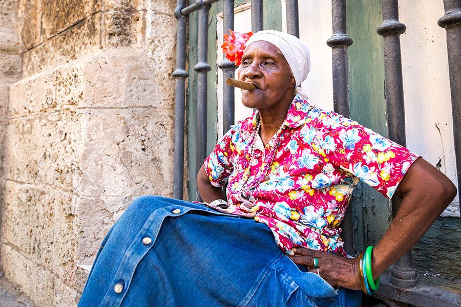 Cuban old lady on cobbled streets | Travel Nation