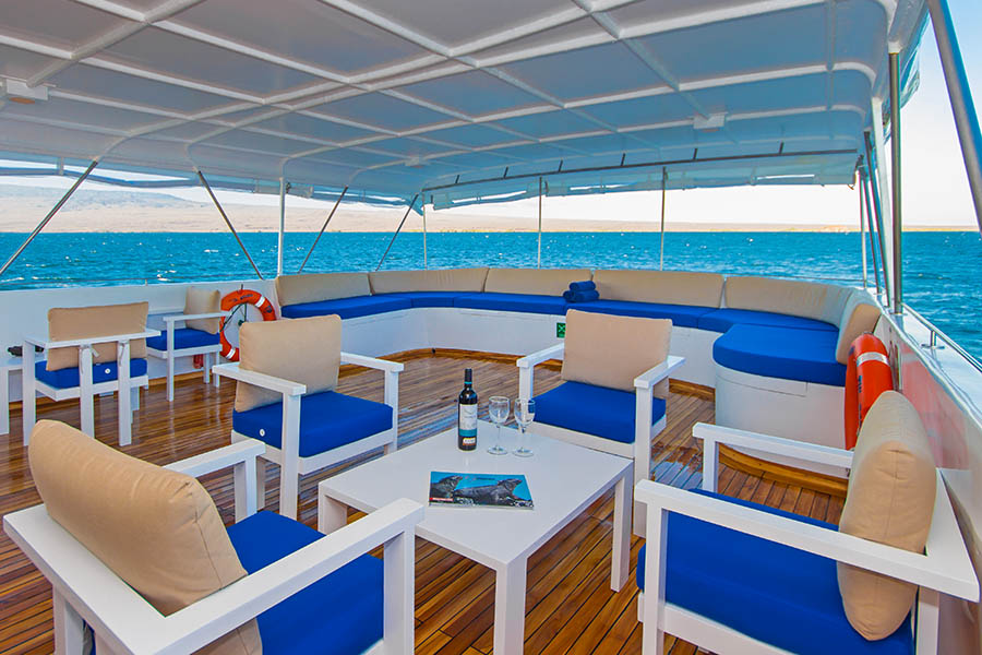 Sip a glass of wine on the Tip Top III in the Galapagos Islands | Photo credit: Andando Tours