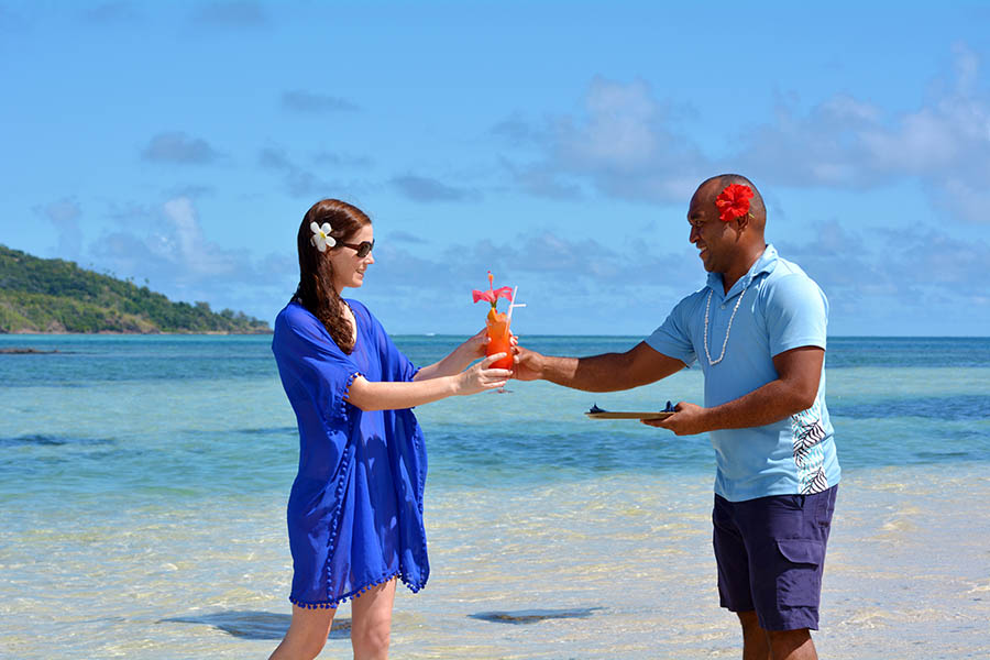 Grab a cocktail on a castaway beach in Fiji | Travel Nation