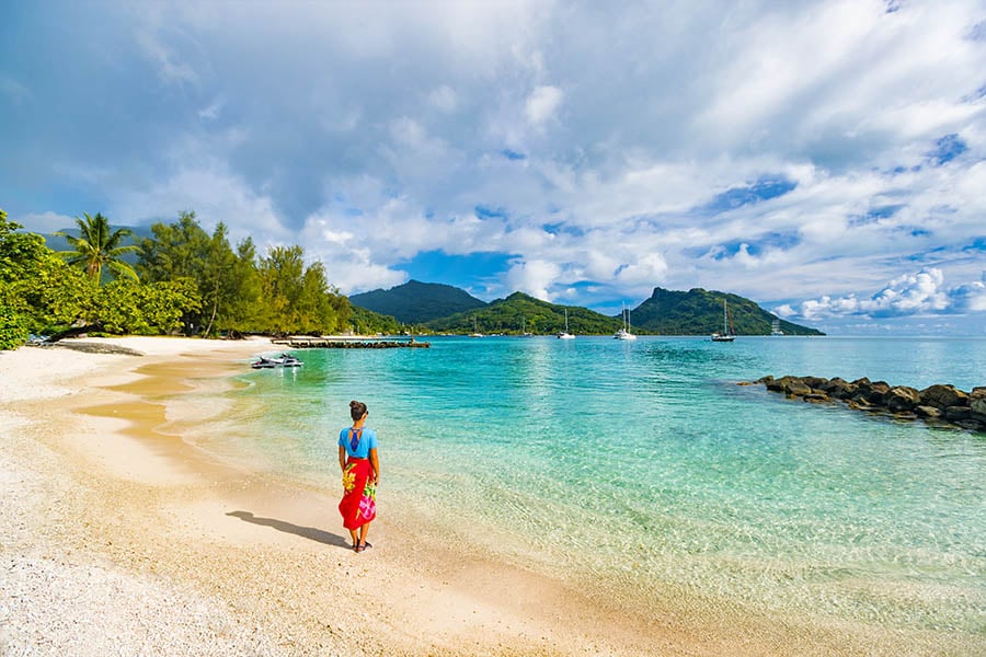 Wade in the bright blue waters of Bora Bora Lagoon | Travel Nation