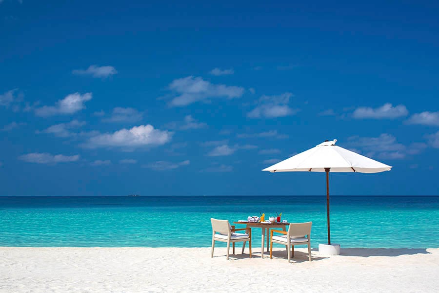 Relax on gorgeous beaches at Velassaru Resort in the Maldives | Photo credit: Velassaru Resort
