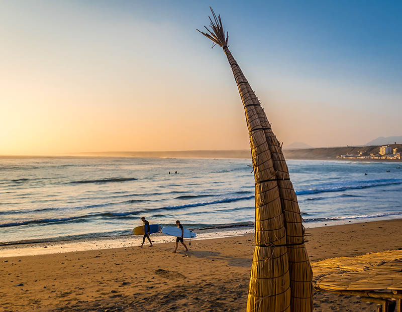 Watch the surfers on Huanchaco Beach at sunset | Travel Nation