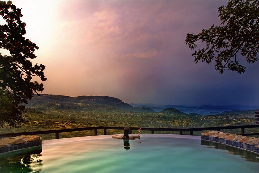 Relax by the pool with views over the Malelane Mountains