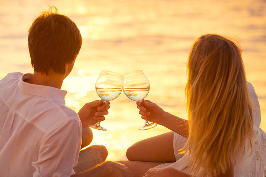 Sip champagne together at sunset in Fiji | Travel Nation