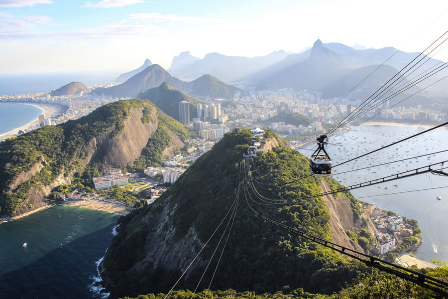 take the cable car up to Sugar Loaf Mountain for exceptional views over Rio’s peaks and bays