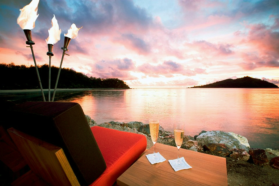 Grab a cocktail and enjoy a Fijian sunset