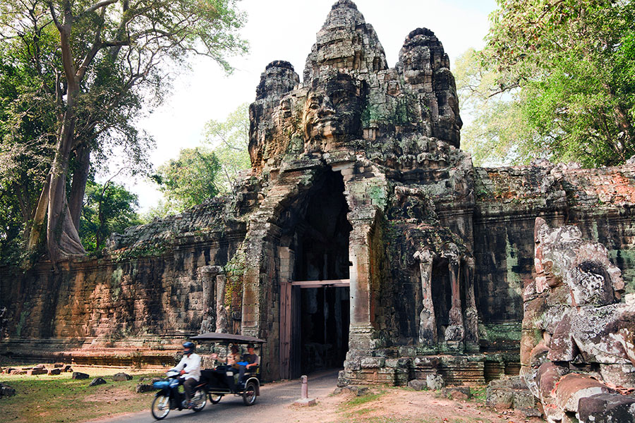 Begin your day at the ancient city of Angkor Thom