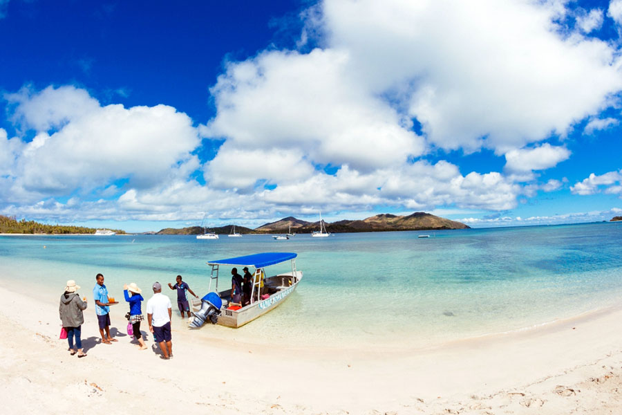Transfer to your idyllic Fijian island resort