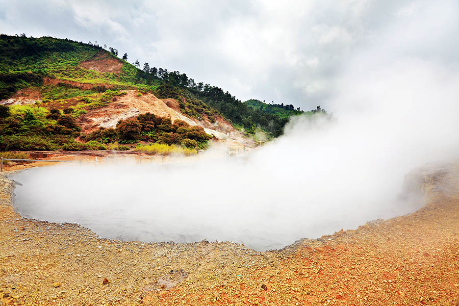 Visit the bubbling waters and sulphurous fumes of Sikidang Crater