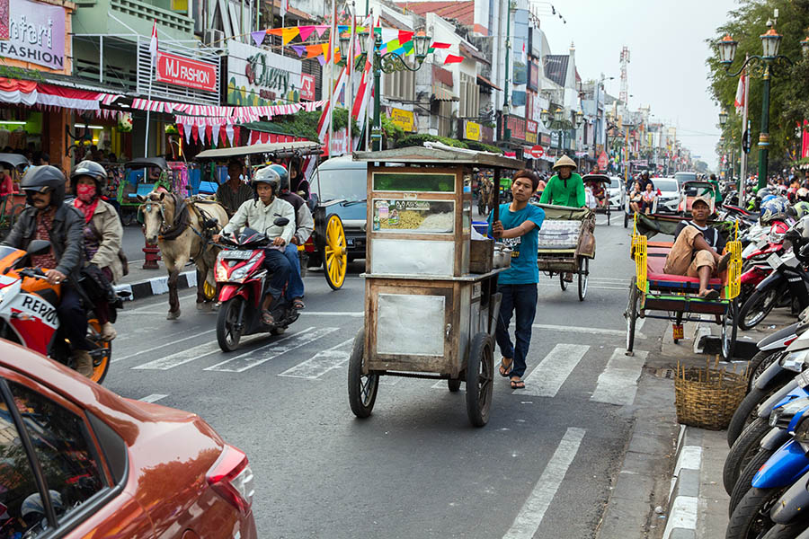 Explore the busy streets of Yogyakarta