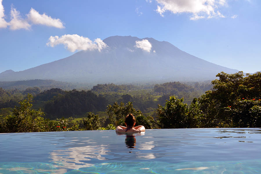 The infinity pool looks onto a spectacular view of Mount Agung The infinity pool looks onto a spectacular view of Mount Agung