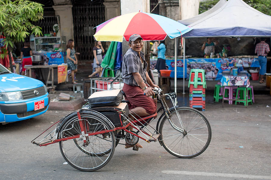Take a trishaw ride through the quiet streets