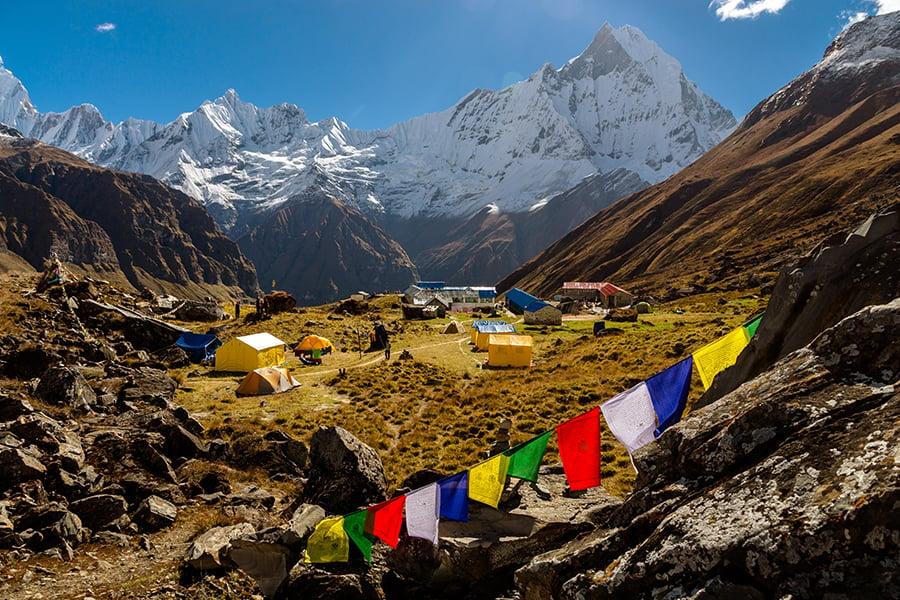Rise through the majestic mountains towards Annapurna Base Camp