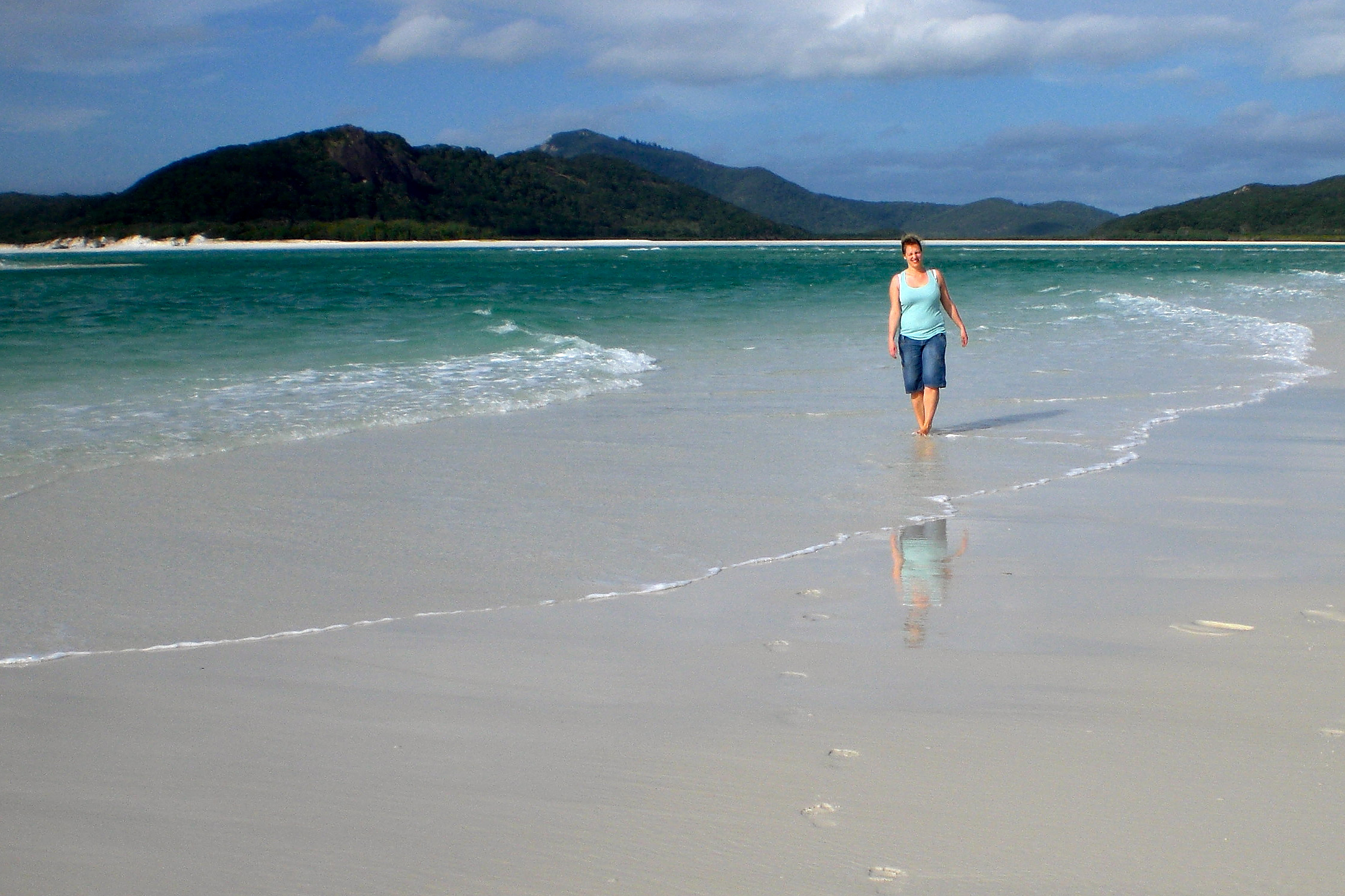 Taking a stroll along the white sands of the Whitsunday Islands in Australia