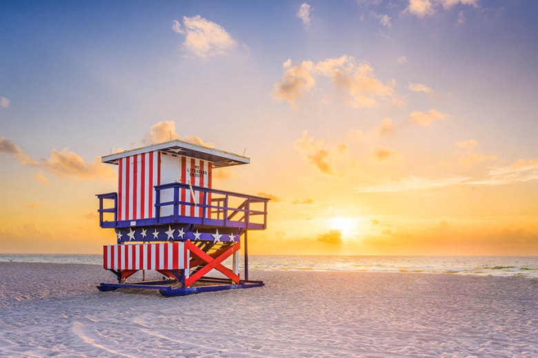 Wander between the classic Miami lifeguard huts at sunset | Travel Nation