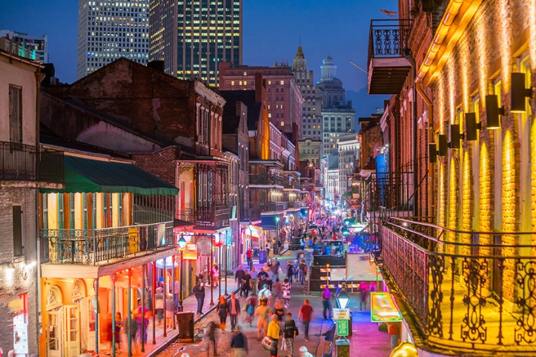 Bourbon Street is loud and bright at night