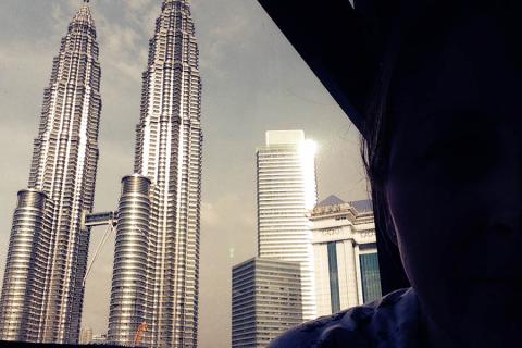 The spectacular view from my bed in Kuala Lumpur!