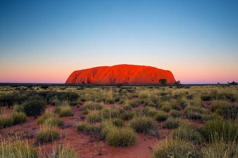 Watch the ever-changing colours of Uluru at sunset | Sydney to Uluru