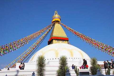 Bright skies and prayer flags at Boudhanath, Kathmandu | Travel Nation