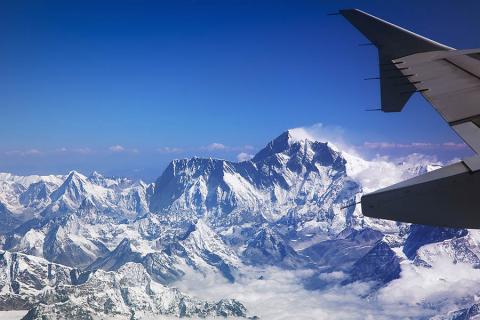 You will fly over the Himalayas and sometimes you can see Mount Everest