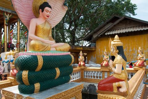 Buddha with Naga at Wat Phnom Yat temple, Pailin, Cambodia