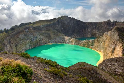 Visit the kaleidoscopic lakes of Kelimutu volcano on Flores Island