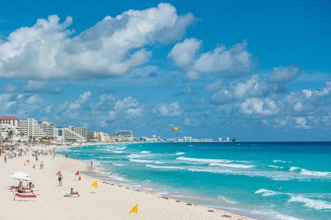 Catch some sun on the white sands of Cancun