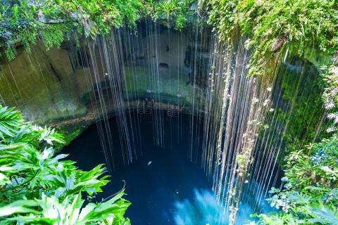 Take a dip in the turquoise waters of an underground cenote
