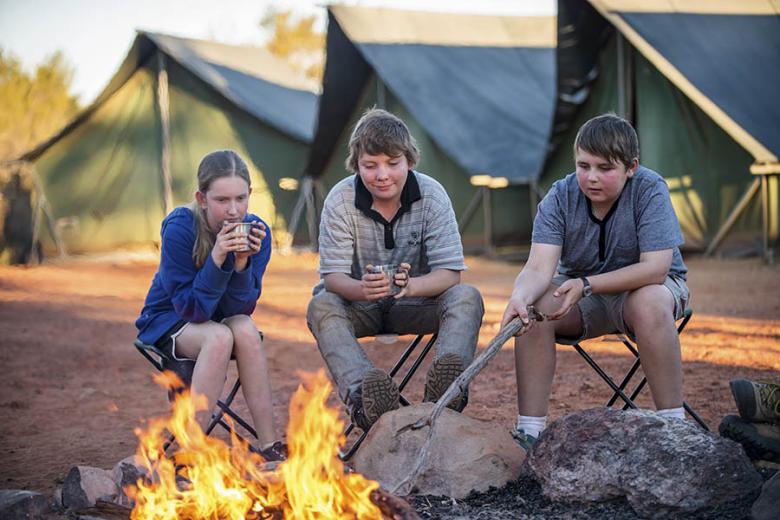 Kids sat around a camp fire | Northern Territory, Australia