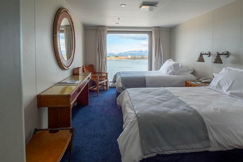 The luxury cabins aboard Ventus Australis | Photo credit: Australis Cruises