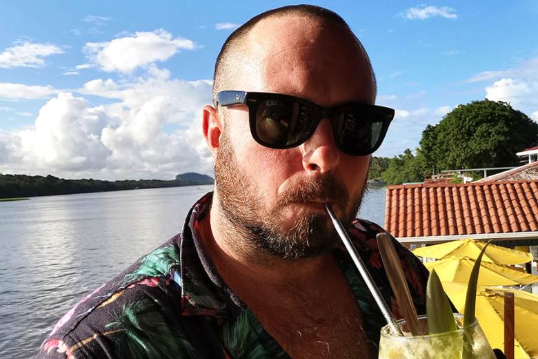Scott drinking cocktails in Costa Rica | Travel Nation