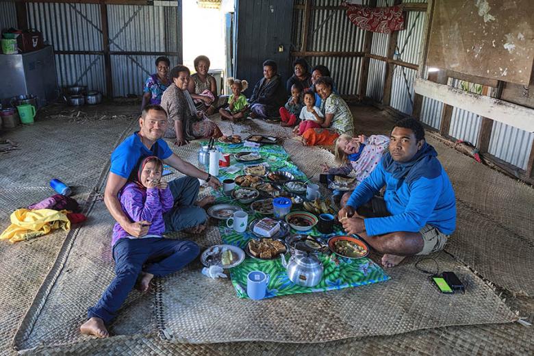 Chris's family visiting a local village in Fiji | Travel Nation