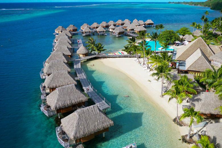 Stay in the beautiful Manava Beach Resort & Spa on Moorea | Credit: Manava Resorts and Hotels