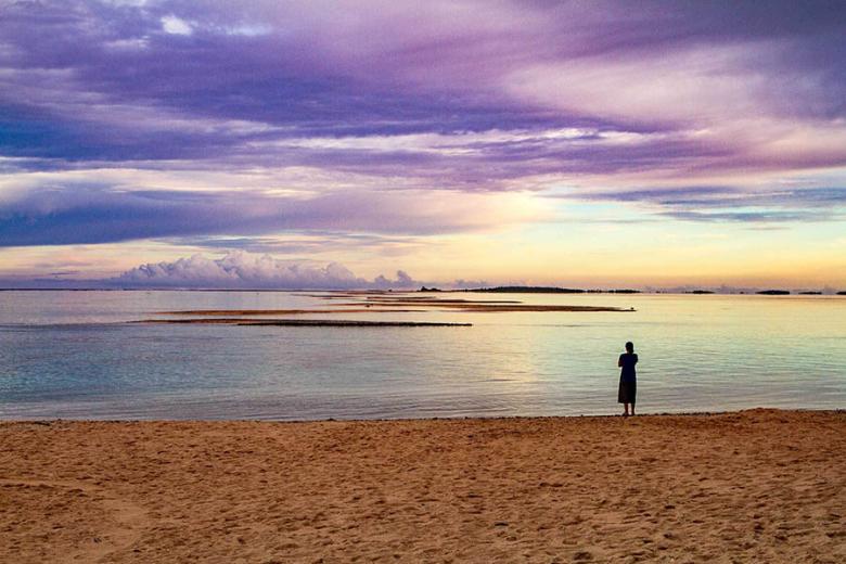 900x600-french-polynesia-ninamu-beach-woman-sunset-credit-ninamu-resort