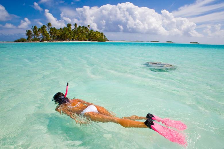 Snorkel through clear blue waters in Bora Bora | Travel Nation