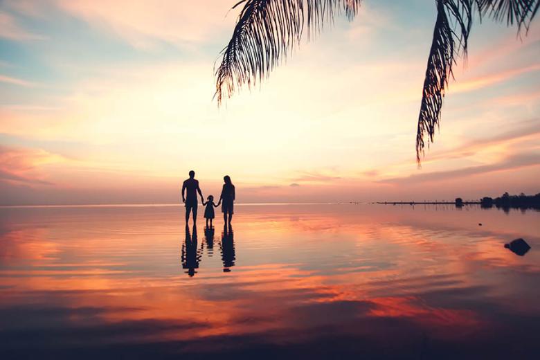 Take family walks on the beach at sunset in Thailand | Travel Nation