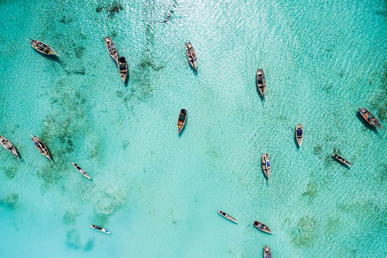 Fishing boats in the waters of Zanzibar | Travel Nation
