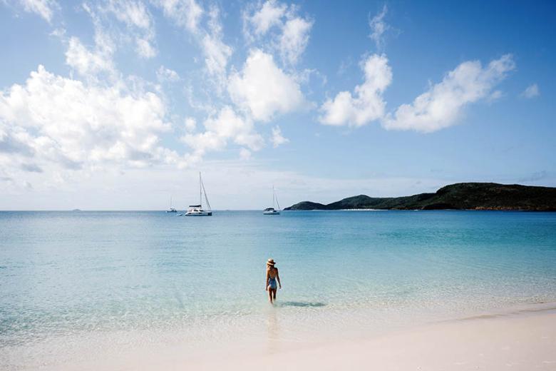 Dig your heels in the soft silica sand of Whitehaven Beach