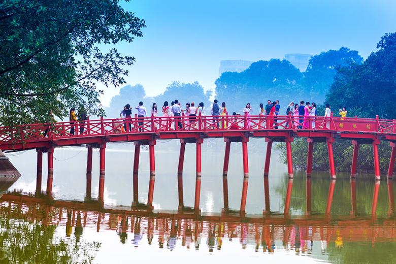 Escape the crowds and head out for a walk around Hoan Kiem Lake