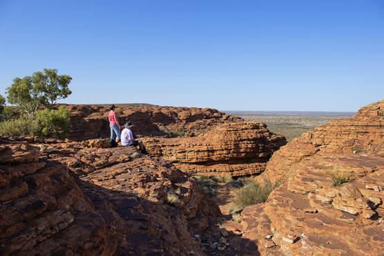 Couple sat on rim of Kings Creek | Northern Territory, Australia