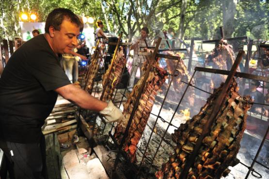 Try a traditional asado (BBQ) on the streets of Mendoza
