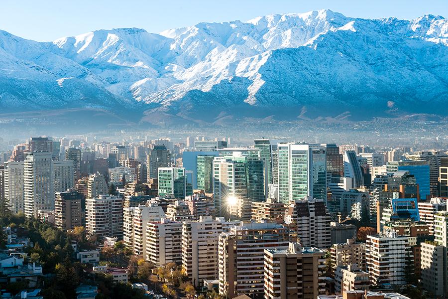 Fly into the capital city of Santiago