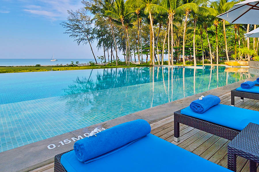Choose from two beautiful pools, including a glimmering infinity pool with views towards the beach