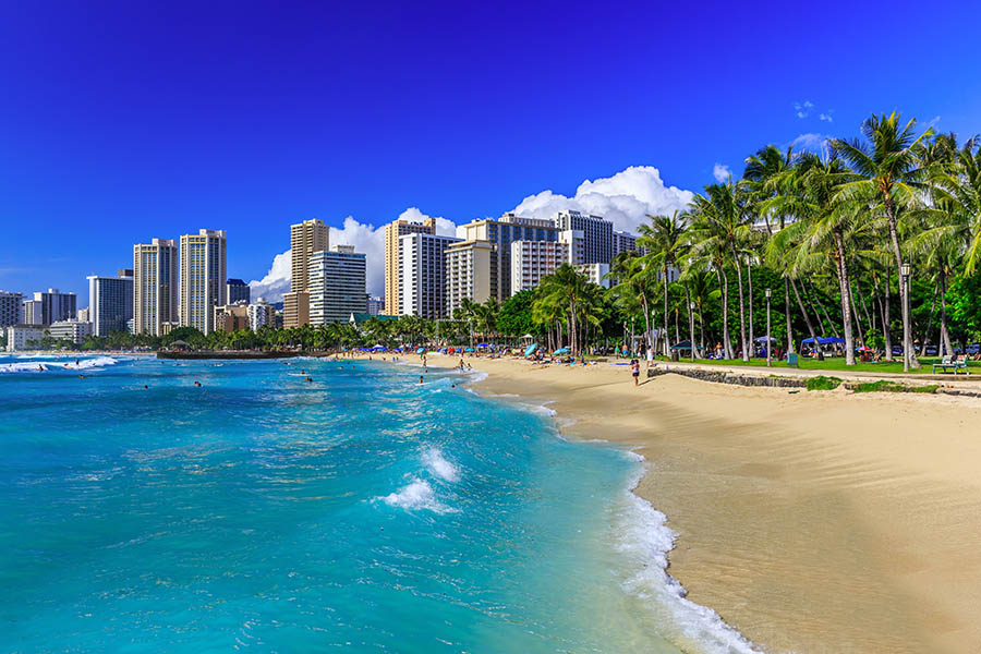 Walk along the famous Waikiki Beach